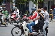 Khi nào xe máy được chở 3 người, không bị phạt?